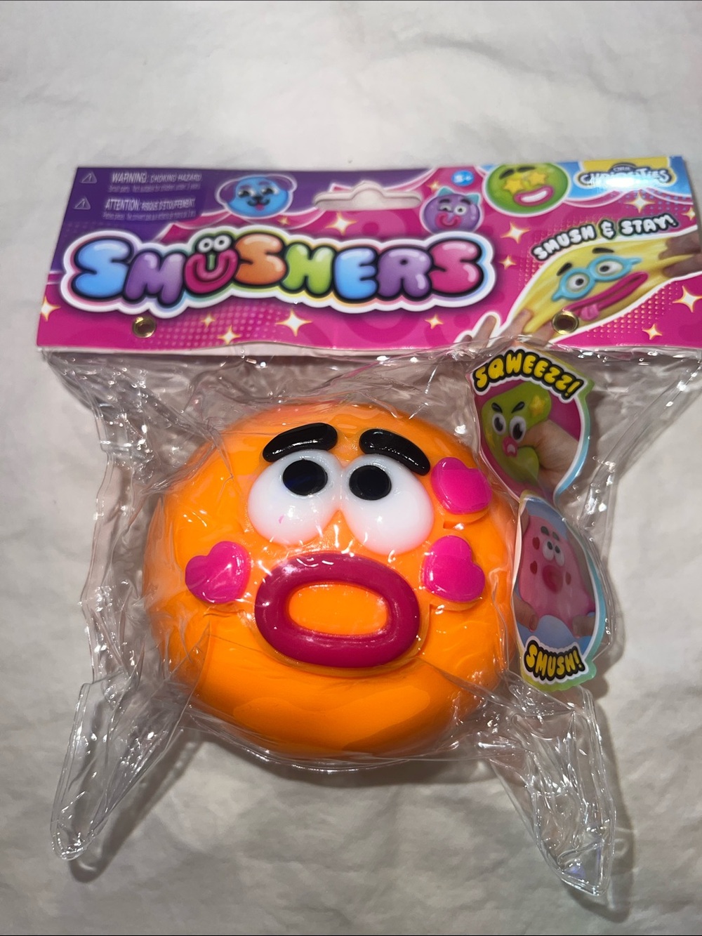 Smushers Orange Squeezy Face Toy
